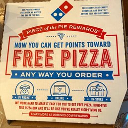 a pizza box with free pizza