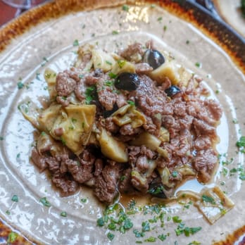 La Vecchia Locanda - Beef strips with artichoke and olives.  So rich in flavor I had to clean my plate with my bread - Italian Near Me - Rome, RM