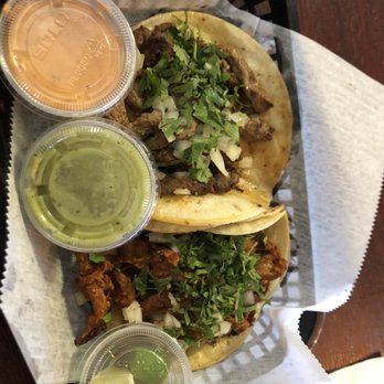 Tacos and Brews - Taco truck style Carne Asada and Trompo. Sauces: green- avocado lime, orange- chipotle garlic - Mexican Near Me - Greenwood, Indiana