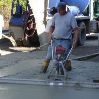M & E Construction - The crew is pouring a concrete pad - General Contractors Near Me M & E Construction - The crew is pouring a concrete pad - General Contractors Near Me