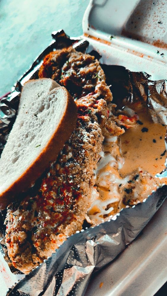 Food from Symon’e Seafood Station