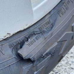 Mia's Express Car Wash - Right front tire damage