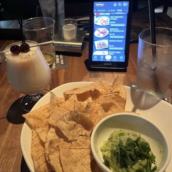 Yard House - Guac & Chips, Pina Colada - New American Near Me - Orlando, Florida Yard House - Guac & Chips, Pina Colada - New American Near Me - Orlando, Florida