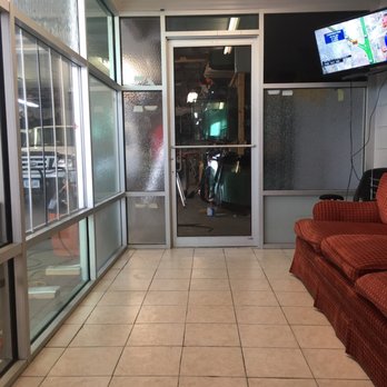 All Glass Installation - The waiting area is clean and well lit! The television is on. - Auto Glass Services Near Me - Grand Prairie, Texas All Glass Installation - The waiting area is clean and well lit! The television is on. - Auto Glass Services Near Me - Grand Prairie, Texas