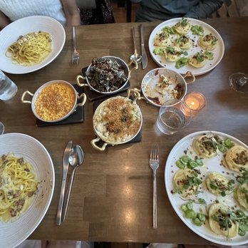 OLIVIA - Bucatini and special of the day pasta (ravioli), corn, truffle Mac and cheese and Brussels sprouts - Italian Near Me - Tampa, Florida OLIVIA - Bucatini and special of the day pasta (ravioli), corn, truffle Mac and cheese and Brussels sprouts - Italian Near Me - Tampa, Florida
