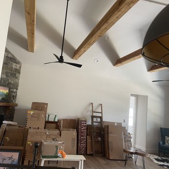 O&J Painting - a living room with a ceiling fan - Painters Near Me O&J Painting - a living room with a ceiling fan - Painters Near Me