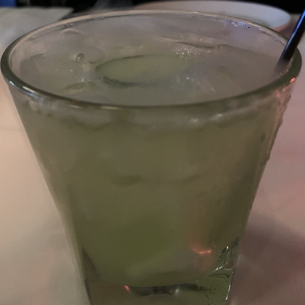 Rick Erwin's Eastside - Par5 Gin, cucumber and little simple syrup Served on rocks with maybe dry ice in bottom. Drink comes out bubbling and vapors on surface. - Steakhouses Near Me - Greenville, South Carolina Rick Erwin's Eastside - Par5 Gin, cucumber and little simple syrup Served on rocks with maybe dry ice in bottom. Drink comes out bubbling and vapors on surface. - Steakhouses Near Me - Greenville, South Carolina