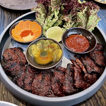 Dōgon - Grilled Wagyu Shorb Rib, Red Stew Jam, Mad Pickles, Baby Greens - Caribbean Near Me - Washington, DC, District of Columbia
