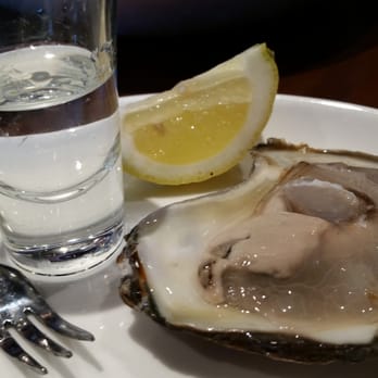 The General Public - East coast oysters were amazing, served with Tito's vodka to shoot! - New American Near Me - San Antonio, Texas