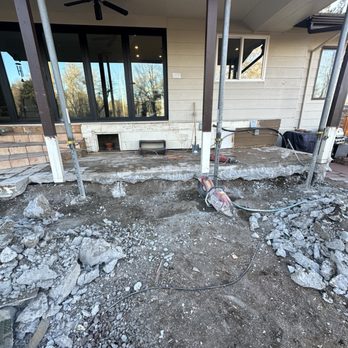 Blue Mountain Contractors - Controlled demolition, un level concrete porch causing water to retain in basement. Building wooden porch on top - Junk Removal & Hauling Near Me Blue Mountain Contractors - Controlled demolition, un level concrete porch causing water to retain in basement. Building wooden porch on top - Junk Removal & Hauling Near Me