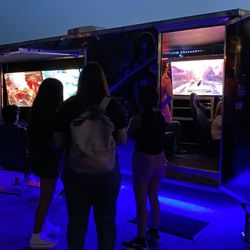 NWA Rolling Video Games - NWA Rolling Video Games Truck with outside TV's and underglow light during an event