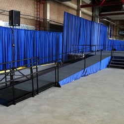Camelot Special Events & Tents, Inc. - Stage Rental with stairs, ramp, skirting and backdrop.  http://www.camelotspecialevents.com/StageRental.htm