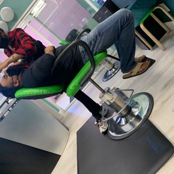 Delhi Fashions - a man sitting on a chair in a salon - Indian Near Me - Richmond, California Delhi Fashions - a man sitting on a chair in a salon - Indian Near Me - Richmond, California