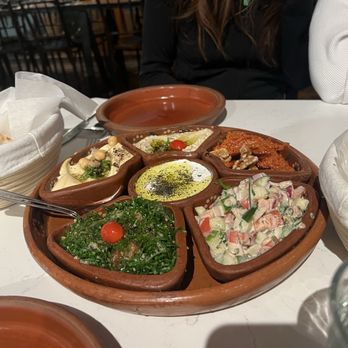 Al Badawi - Mezzi Filistini, a mixed platter of babaganoush, muhammara, tabbouleh, salata, tahini and labneh. - Middle Eastern Near Me - Brooklyn, New York Al Badawi - Mezzi Filistini, a mixed platter of babaganoush, muhammara, tabbouleh, salata, tahini and labneh. - Middle Eastern Near Me - Brooklyn, New York