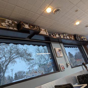 Le TRAMWAY - Suitcases above the windows - Cafes Near Me - Edmonton, Alberta