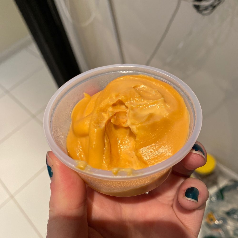 cheese colored wall spackle being sold as cheese sauce. cheese colored wall spackle being sold as cheese sauce.