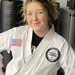 Texas Black Belt Academy - Daughter promoted to yellow belt!