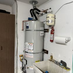 IDR Plumbing & Sewer Service - The new heater with an expansion tank ! and all updates