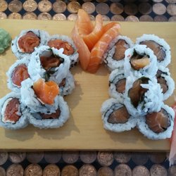 Philly roll, salmon sashimi and salmon rolls.
