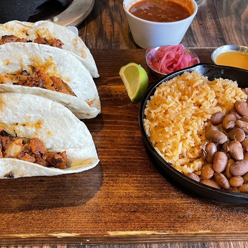 Mezcaluna - Pastor taco with ranchero beans and rice - Mexican Near Me - Happy Valley, Oregon Mezcaluna - Pastor taco with ranchero beans and rice - Mexican Near Me - Happy Valley, Oregon