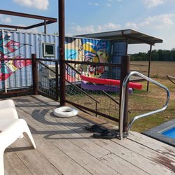 Flophouze Shipping Container Hotel - Our room(container) from the pool