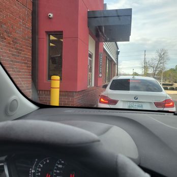 Wendy's - a view of a car driving down the street - Burgers Near Me - Memphis, Tennessee Wendy's - a view of a car driving down the street - Burgers Near Me - Memphis, Tennessee