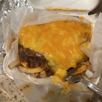 Johnny Rockets - Chili cheese fries. I like that they smother it and use the cheese sauce AND shredded cheese. - Diners Near Me - Kapolei, Hawaii