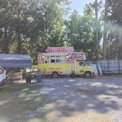 El Rinconcito Latino - El Rinconcito Latino food truck. Fixed location, lovely covered seating area.