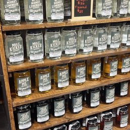 a display of jars of honey a display of jars of honey