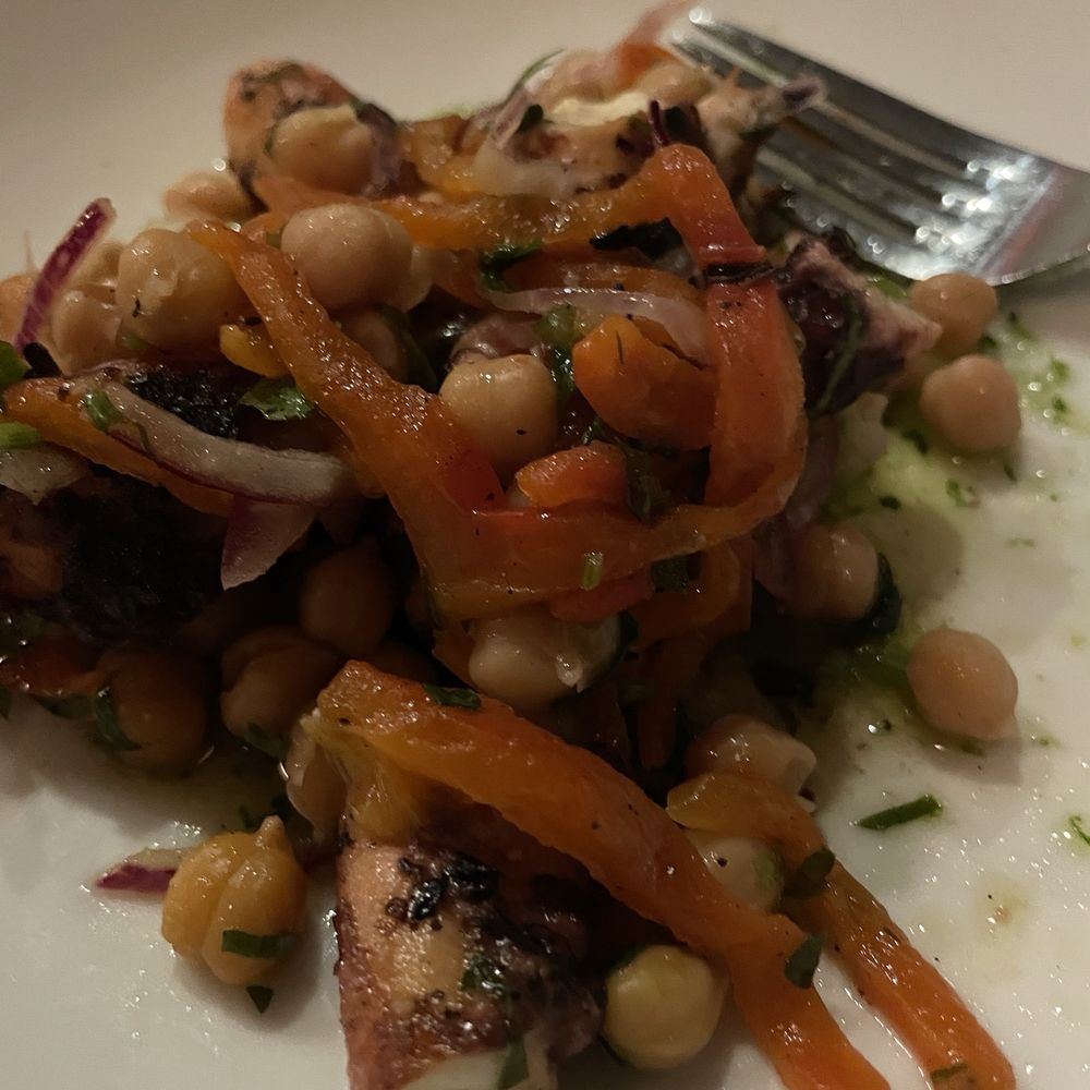 Grilled octopus with chickpeas minus a few bites Grilled octopus with chickpeas minus a few bites