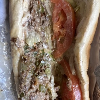 Crown Fried Chicken - Their terrible attempt as a Philly, two chuck tomatoes and a little beef spread just in the middle. This is ridiculous. - Chicken Wings Near Me - Fayetteville, North Carolina Crown Fried Chicken - Their terrible attempt as a Philly, two chuck tomatoes and a little beef spread just in the middle. This is ridiculous. - Chicken Wings Near Me - Fayetteville, North Carolina