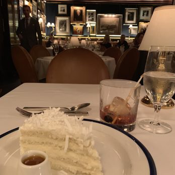 RL Restaurant - Coconut cake with passion fruit something (?) on the side. Superb! - New American Near Me - Chicago, Illinois RL Restaurant - Coconut cake with passion fruit something (?) on the side. Superb! - New American Near Me - Chicago, Illinois