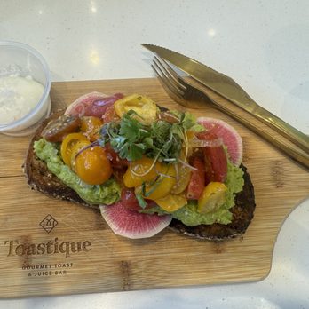 Toastique - Avocado toast with poached egg. - Juice Bars & Smoothies Near Me - Balboa Island, California Toastique - Avocado toast with poached egg. - Juice Bars & Smoothies Near Me - Balboa Island, California