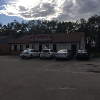 Hunam Palace - cars parked in a parking lot - Chinese Near Me - Junction City, Kansas