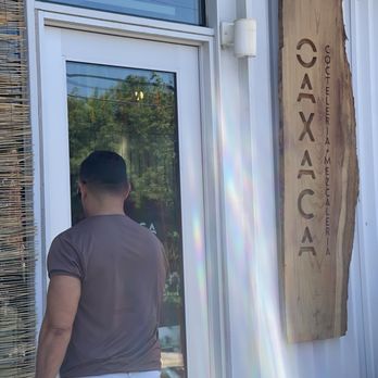 Oaxaca - Partner walking into restaurant - Mexican Near Me - Sacramento, California Oaxaca - Partner walking into restaurant - Mexican Near Me - Sacramento, California