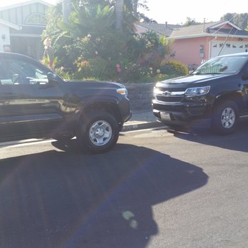 Boice General Contractor DBA The Workaholics - a tow truck towing a pickup truck - General Contractors Near Me - San Pablo, California Boice General Contractor DBA The Workaholics - a tow truck towing a pickup truck - General Contractors Near Me - San Pablo, California