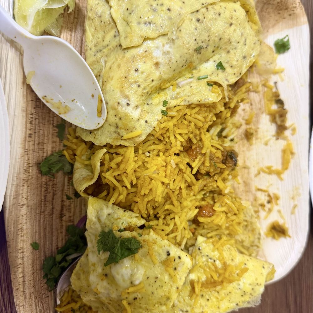 Brundavan - Flavorful Brundavan Potlam Biryani ( omelet wrapped Chicken Biryani ) - Indian Near Me - Tracy, California Brundavan - Flavorful Brundavan Potlam Biryani ( omelet wrapped Chicken Biryani ) - Indian Near Me - Tracy, California