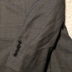 Men's Wearhouse - New suit that was altered and the way it was given to me.