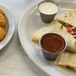 North End Cafe - Breakfast quesadilla and tots. Tasty! I still think the eggs Benedict is the best.