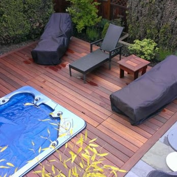 Mountainview Armordeck - a hot tub and lounge chairs - General Contractors Near Me Mountainview Armordeck - a hot tub and lounge chairs - General Contractors Near Me