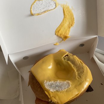 Suzy Donuts - The top of what was supposed to be the "sausage egg and cheese" toasted bagel with cheese and jalapeño - Donuts Near Me - Dallas, Texas Suzy Donuts - The top of what was supposed to be the "sausage egg and cheese" toasted bagel with cheese and jalapeño - Donuts Near Me - Dallas, Texas