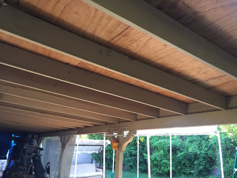 Slide of Mike's Roofing & Building