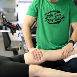 Foothills Sports Medicine Physical Therapy - Stretching patients leg after knee replacement