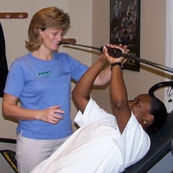 Axis Physical Therapy - Leanne L. Burns, PT working with patient Axis Physical Therapy Jacksonville, NC