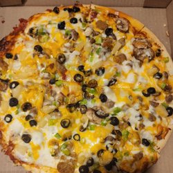 Snug Harbor Bar & Grill - 12 inch combo pizza!!