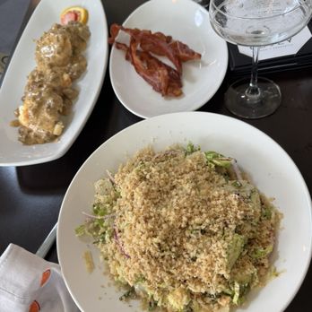 Covey Kitchen + Cocktails - Brussels sprouts, salad and biscuits and gravy - Cocktail Bars Near Me - Gainesville, Florida Covey Kitchen + Cocktails - Brussels sprouts, salad and biscuits and gravy - Cocktail Bars Near Me - Gainesville, Florida