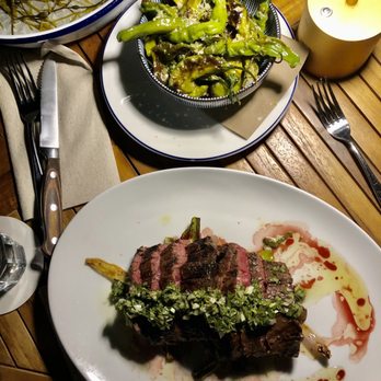 The East Pole - a plate of steak with a side of asparagus - New American Near Me - New York, New York The East Pole - a plate of steak with a side of asparagus - New American Near Me - New York, New York