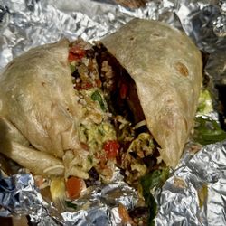 Chipotle - Chicken burrito with rice, beans, salsa, avocado, and lettuce.