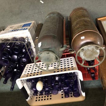 The Attic Antiques - Bottle are grouped by color. This is the purple group. And two really cool old fire extinguishers! Considering Savannah's fire history... - Antiques Near Me - Savannah, Georgia The Attic Antiques - Bottle are grouped by color. This is the purple group. And two really cool old fire extinguishers! Considering Savannah's fire history... - Antiques Near Me - Savannah, Georgia