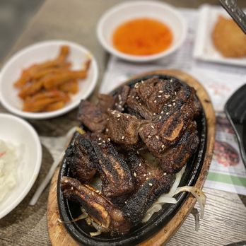 Kaju Soft Tofu - a variety of foods on a table - Korean Near Me - Irvine, California